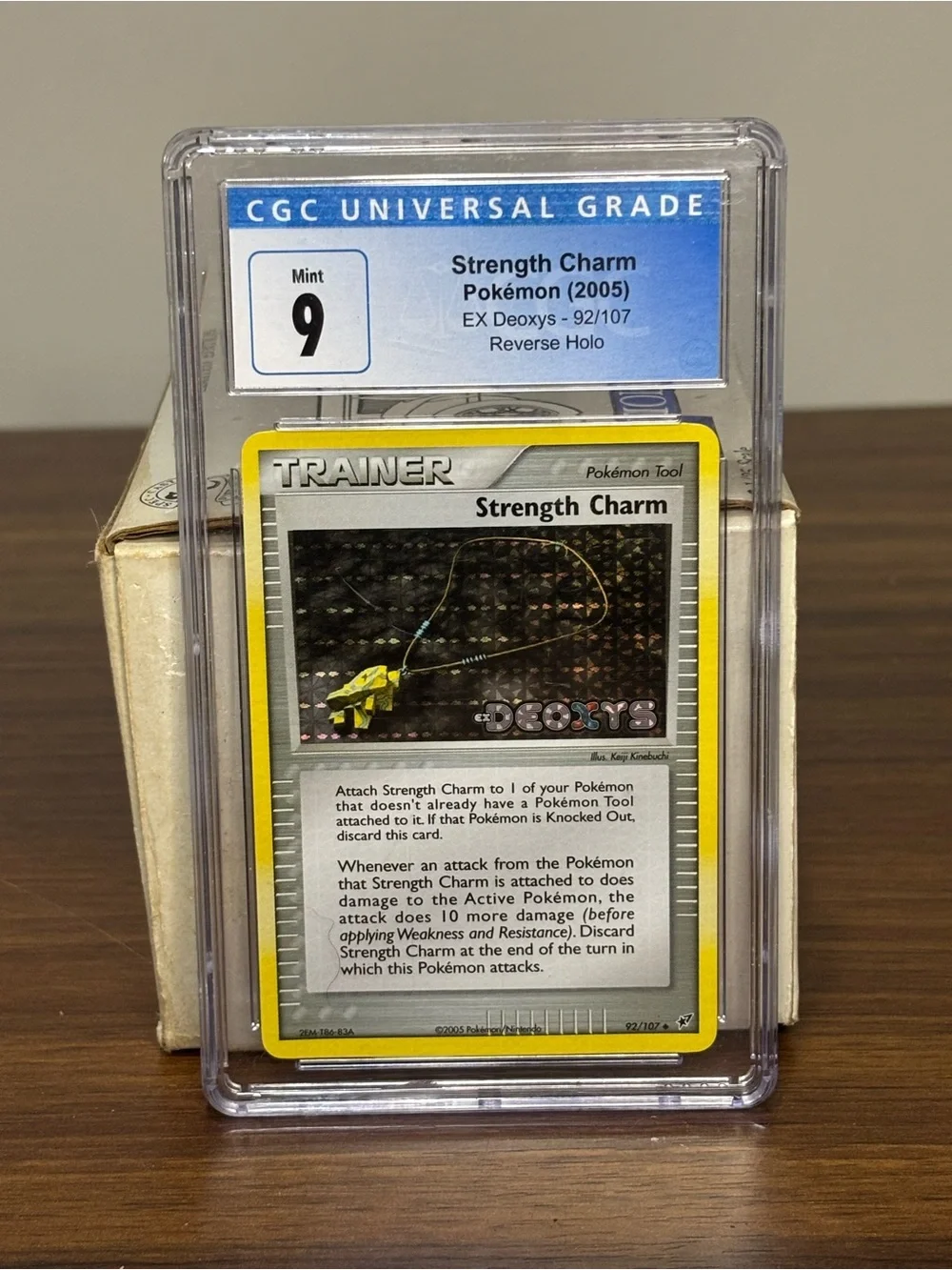 Strength Charm 92/107 Deoxys Reverse Holo Stamped CGC 9 Pokemon Card